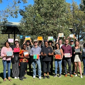 Staff and students with their artwork